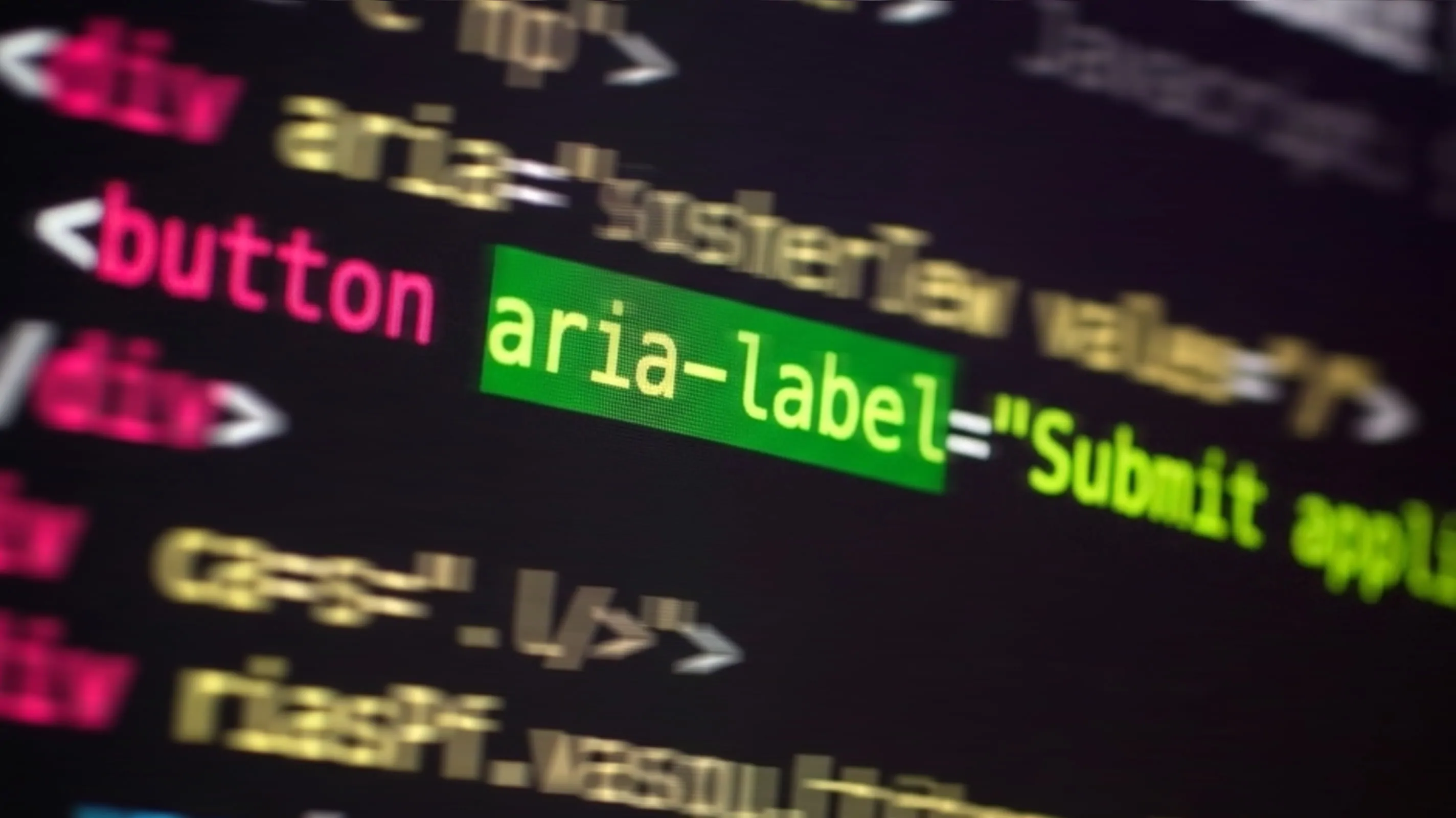 A close-up of syntax-highlighted HTML code on a dark screen, with the aria-label attribute highlighted in green on a button element, surrounded by other partially visible ARIA-related code in pink and yellow.